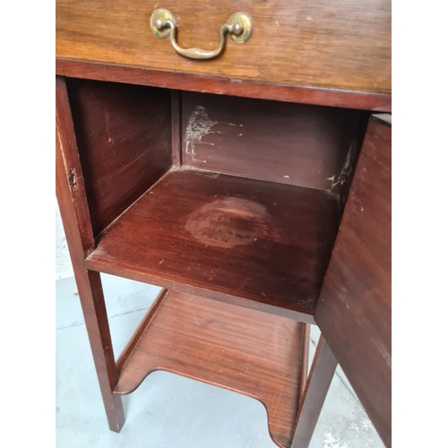 398 - An Edwardian mahogany shaving stand with hexagonal bevelled edge mirror