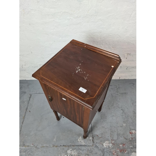 405 - An Edwardian inlaid mahogany bedside cabinet