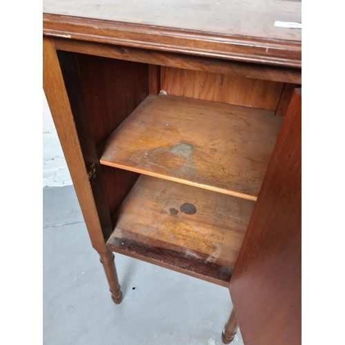 405 - An Edwardian inlaid mahogany bedside cabinet