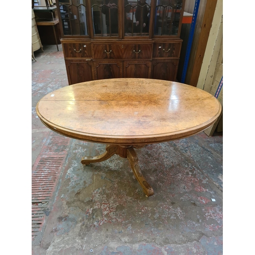 416 - A Victorian burr walnut pedestal loo table