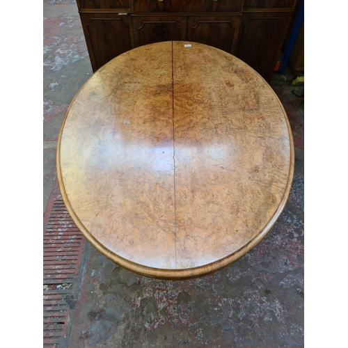 416 - A Victorian burr walnut pedestal loo table