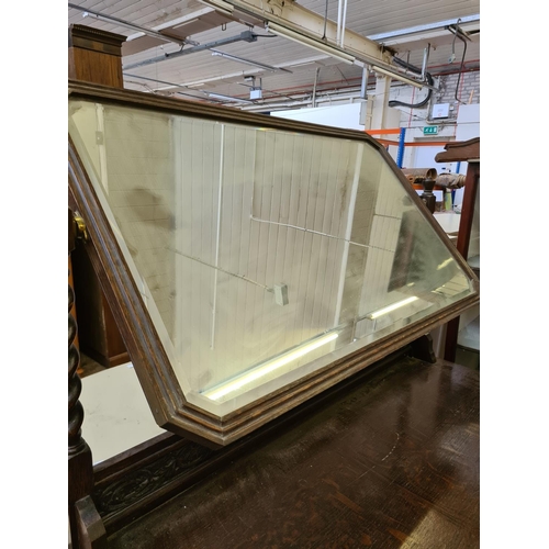 429 - An early 20th century oak dressing chest on casters with mirror on barley twist supports - approx. 1... 