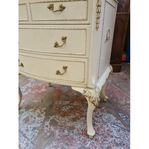 437 - A French style cream and gilt bedside cabinet on cabriole supports - approx. 61cm wide x 75cm high x... 