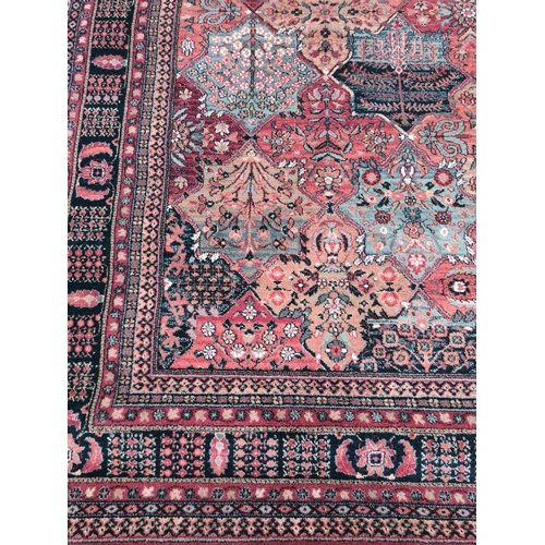 448 - A John Lewis Royal Heritage red rug - approx. 200cm x 300cm - original price £575