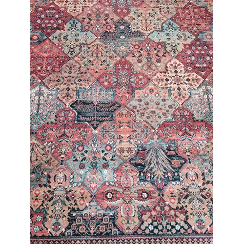 448 - A John Lewis Royal Heritage red rug - approx. 200cm x 300cm - original price £575