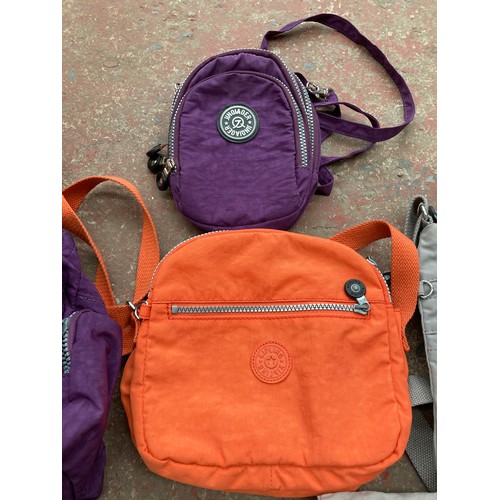 1277A - Five various Kipling handbags and one other branded smaller bag