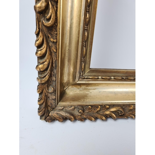 275 - A pair of ornate gilt frames, one containing lithograph titled 'Mes Chats' by Daniel Hernandez appro... 