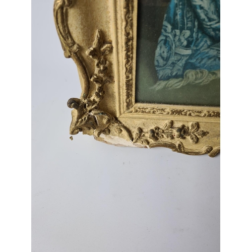 279 - A large gilt framed print depicting bride and bridesmaid getting ready approx. 76cm x 67cm