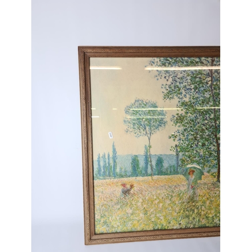 282 - A large framed print of Claude Monet's 'Fields In Spring' original painted in 1887 approx. 95cm x 77... 