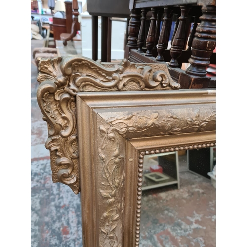 286 - A large Victorian gilt framed mirror - approx. 122cm high x 86cm wide