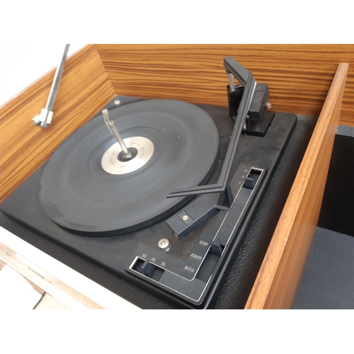 1001 - A 1970s teak effect model 3369 Ferguson stereo radiogram with tuner amp, turntable and instruction m... 