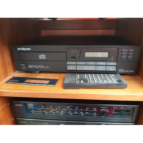 1003 - A Sutcliffe hi-fi cabinet containing an Aiwa hi-fi comprising twin tape deck, tuner amp with graphic... 