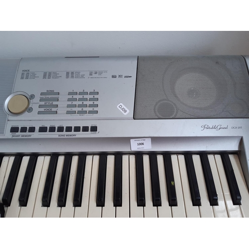 1006 - A Yamaha DGX-205 'Portable Grand' Electric Piano/Electronic Keyboard with power pack