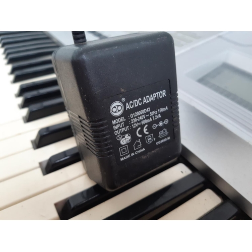 1006 - A Yamaha DGX-205 'Portable Grand' Electric Piano/Electronic Keyboard with power pack