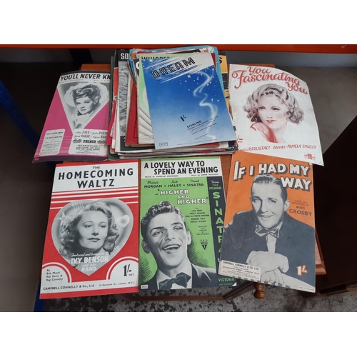 1013 - A collection of antique and vintage sheet music to include The Wreck of the Titanic, The Homecoming ... 