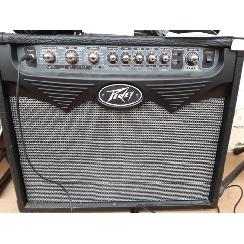 1014 - A complete electric guitar package to include Peavey Vampyr 30w modeling amplifier, white Ibanez ART... 