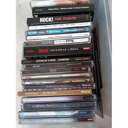 1023 - A large collection of CDs, DVDs and vinyl records to include Slipknot, AC/DC, While She Sleeps (sign... 