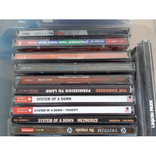 1023 - A large collection of CDs, DVDs and vinyl records to include Slipknot, AC/DC, While She Sleeps (sign... 