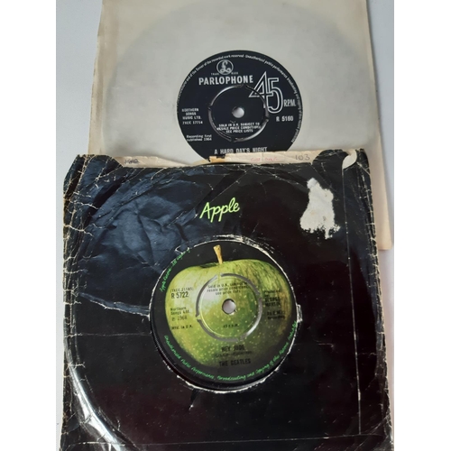 1033 - A record case containing a collection of approx. 22 Beatles 7