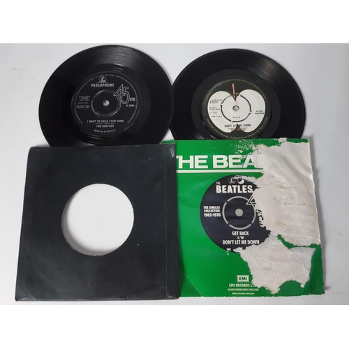 1033 - A record case containing a collection of approx. 22 Beatles 7