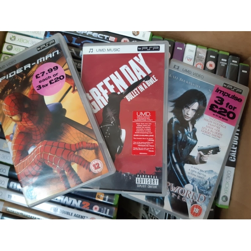 1037 - Three boxes containing Sony PSP with film and game discs, Original Xbox and Xbox 360 games to includ... 