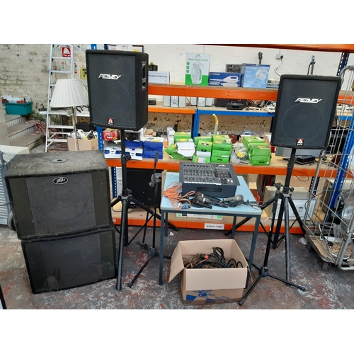 1040 - A Peavey PA system to include XR800F+ 1000w powered mixer, pair Hisys 1RX speakers, pair Pro-Sub spe... 