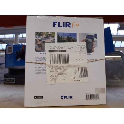 1047 - A boxed Flir FX outdoor wireless HD video monitoring system