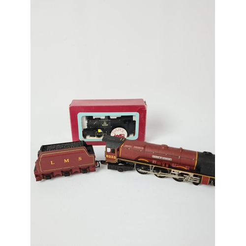 237 - Two items, a boxed Dapol OO gauge J94 BR black bunker and a Duchess of Sutherland locomotive and ten... 