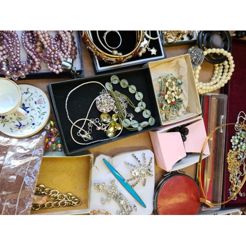 300 - A box containing various costume jewellery