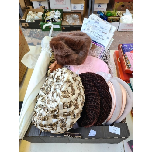 303 - A box containing various fashion accessories to include Wolsey Monte Carlo stockings, hats, approx. ... 