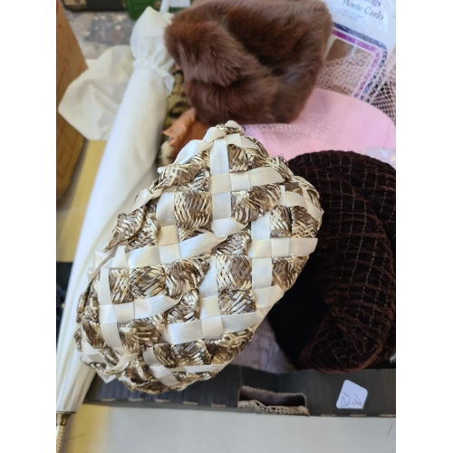303 - A box containing various fashion accessories to include Wolsey Monte Carlo stockings, hats, approx. ... 