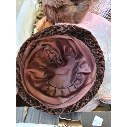 303 - A box containing various fashion accessories to include Wolsey Monte Carlo stockings, hats, approx. ... 