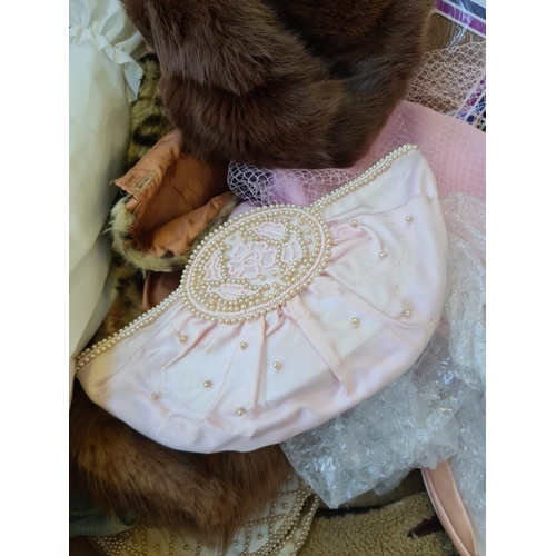 303 - A box containing various fashion accessories to include Wolsey Monte Carlo stockings, hats, approx. ... 