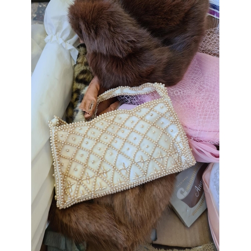 303 - A box containing various fashion accessories to include Wolsey Monte Carlo stockings, hats, approx. ... 