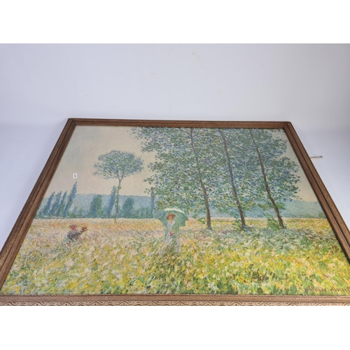 320 - A large framed print of Claude Monet's 'Fields In Spring' original painted in 1887 approx. 95cm x 77... 