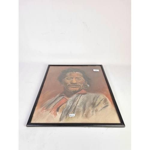 322 - A framed pastel of a Tibetan wool merchant with signature lower left - approx. 48cm x 40cm