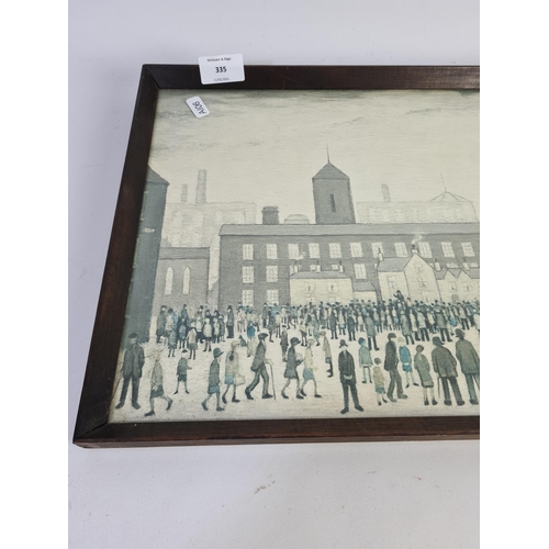 335 - A framed print titled ‘Outside The Mills’ by L.S. Lowry - approx. 53cm x 31cm