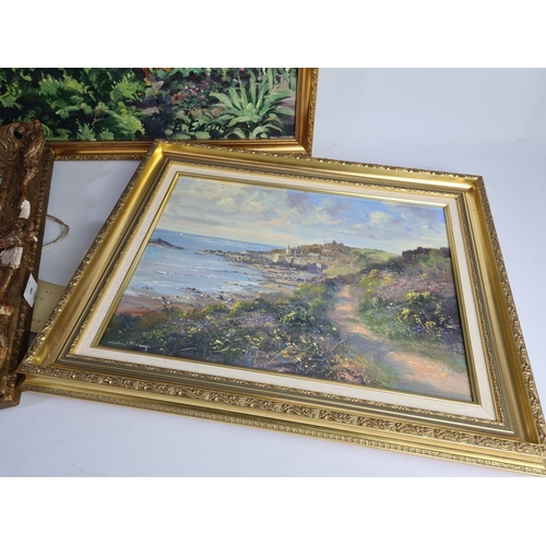 336 - Three gilt framed oil on canvas paintings to include one of Newlyn harbour, one of a coastal scene s... 