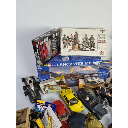 227 - A large quantity of various model making kits and model vehicles