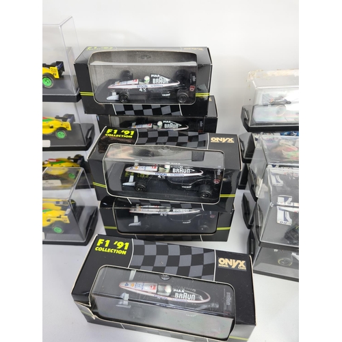 232 - Twenty five Onyx Formula 1 model cars