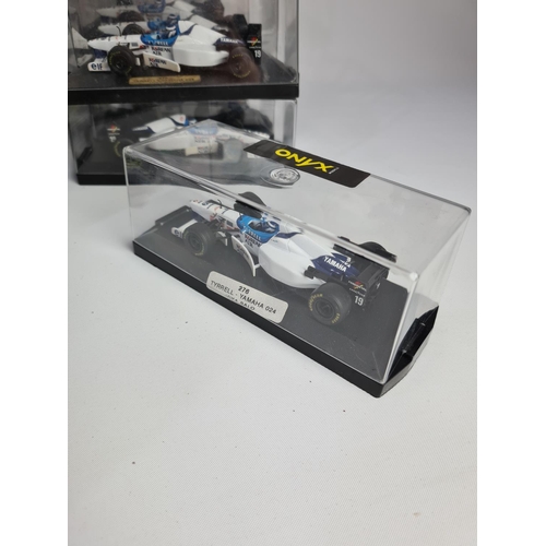 232 - Twenty five Onyx Formula 1 model cars