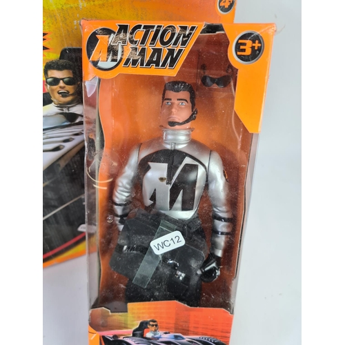 244 - A boxed Action Man super car with super car driver and stickers