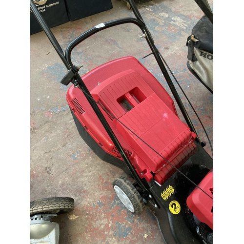 1264 - A black and red Mountfield HP470 petrol lawnmower with Briggs & Stratton engine and grass collector