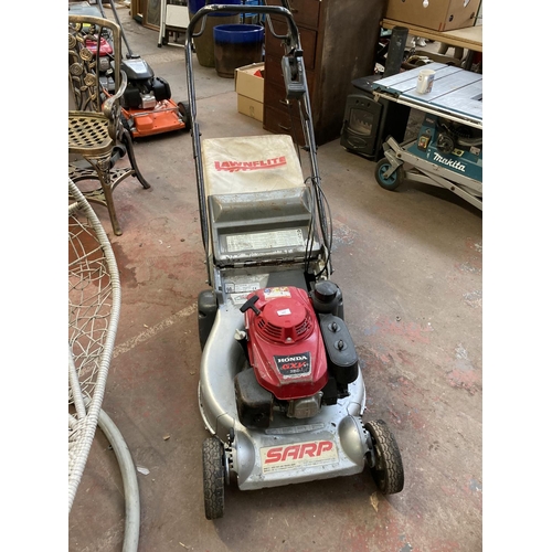 1265 - A black red and grey Sarp petrol roller mower with Honda GXV160 engine and grass collector