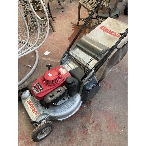 1265 - A black red and grey Sarp petrol roller mower with Honda GXV160 engine and grass collector