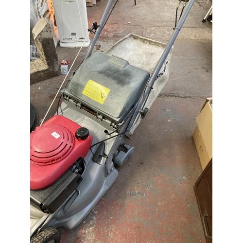 1266 - A red and grey Honda HRB475 petrol roller mower with grass collector