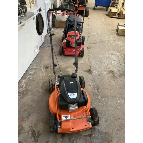 1267 - A black and orange Husqvarna LB553S professional petrol lawnmower with Honda GCV170 engine