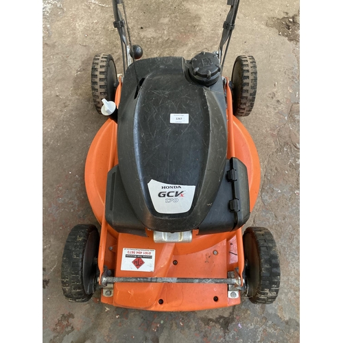 1267 - A black and orange Husqvarna LB553S professional petrol lawnmower with Honda GCV170 engine