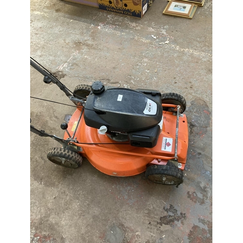 1267 - A black and orange Husqvarna LB553S professional petrol lawnmower with Honda GCV170 engine