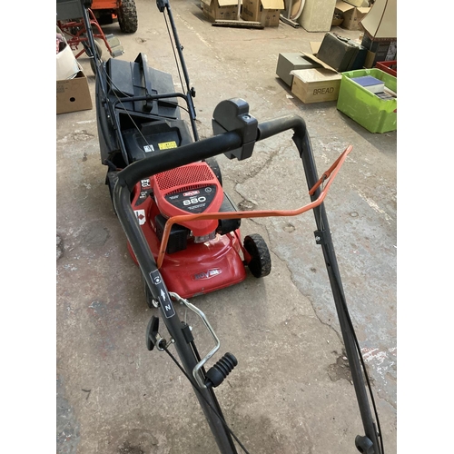 1267 - A black and orange Husqvarna LB553S professional petrol lawnmower with Honda GCV170 engine